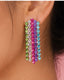 Close-up of rainbow crystal tassel earrings featuring colorful rhinestone strands