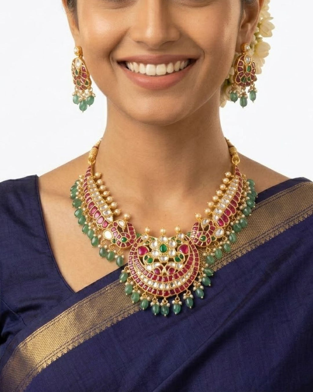 Morvaara Emerald Kundan Bridal Set | 18K Gold Plated Red, White & Green Stone Statement Jewellery
