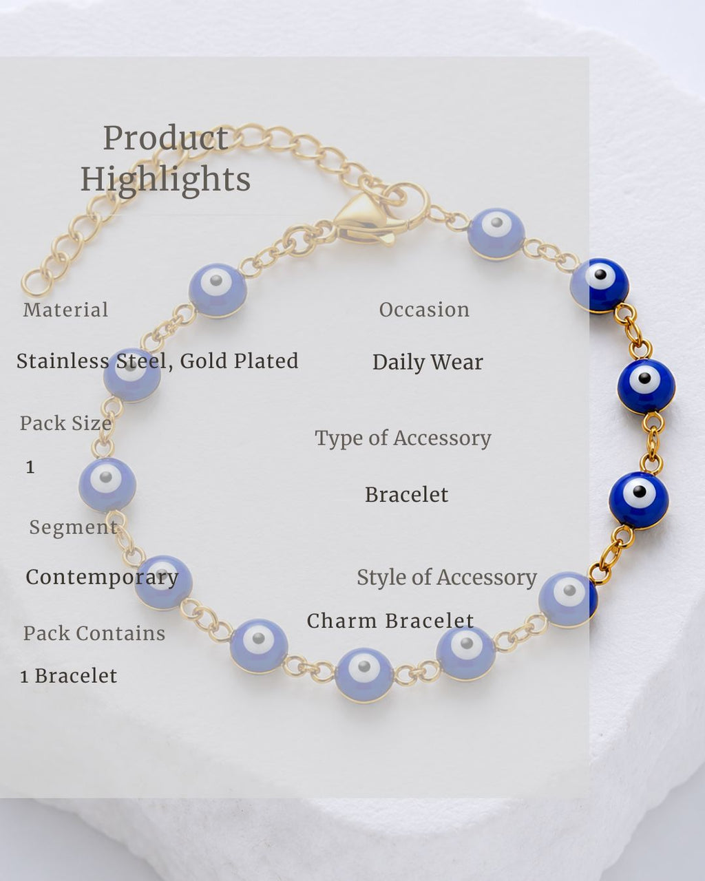 Gold bracelet with blue evil eye beads on a white background
