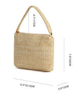 Beige straw handbag with dimensions indicated on a white background