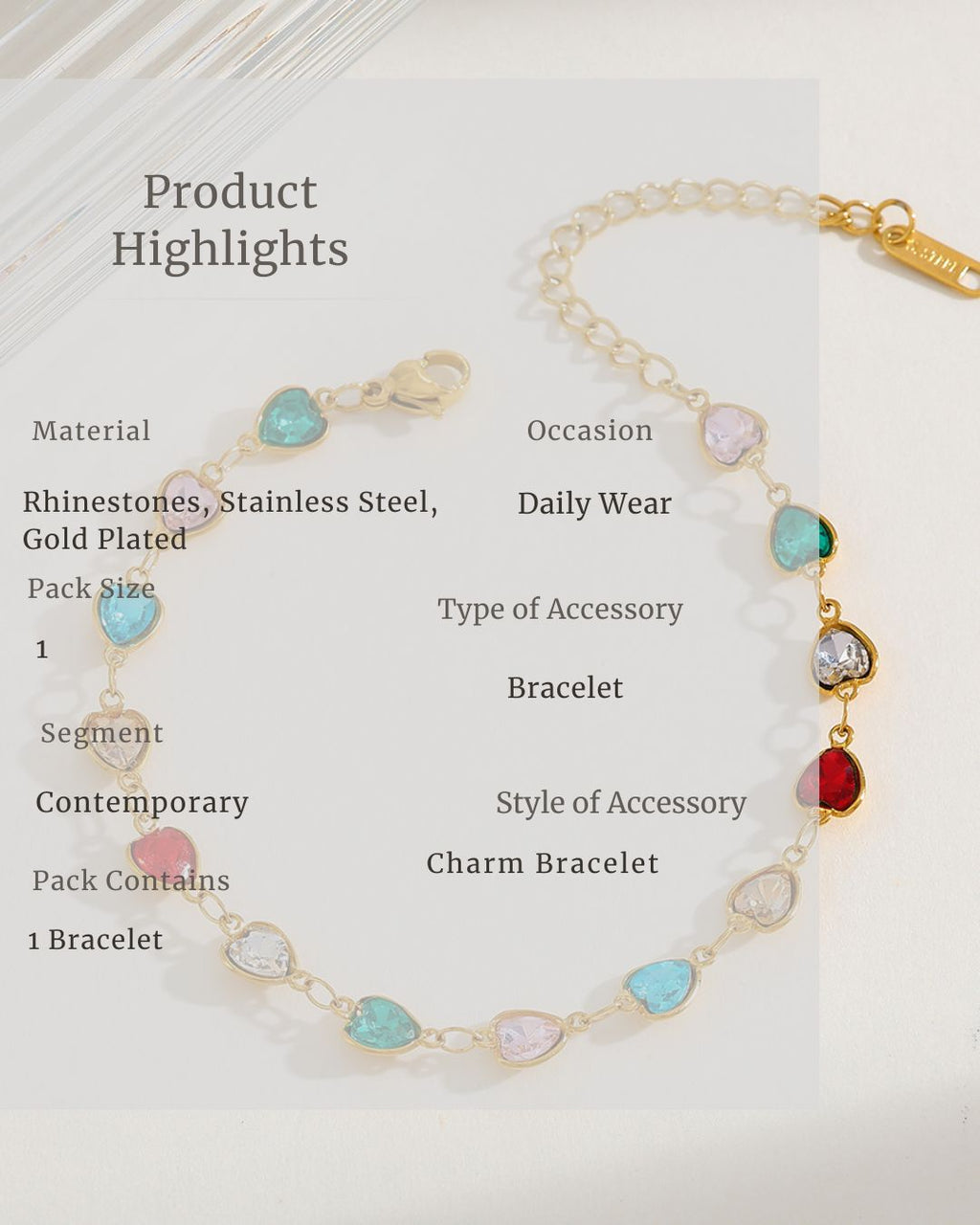 Charm bracelet with rhinestones on a white background