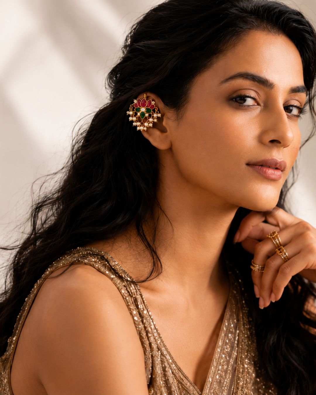 lotus kundan ear cuff styled on saree