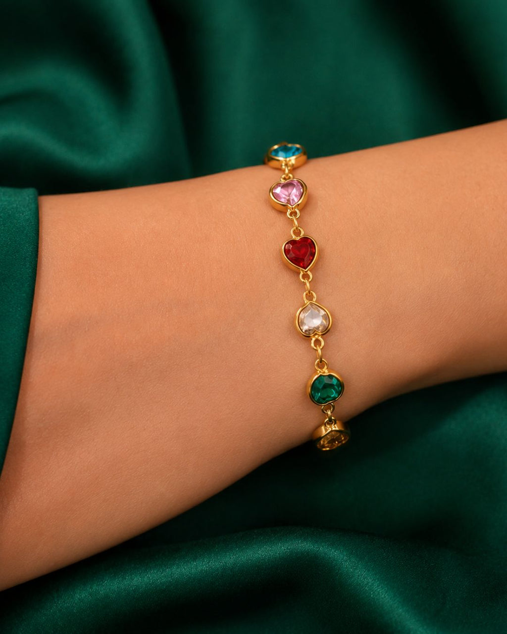 Close-up of Candy Hearts Charm Bracelet featuring colorful heart-shaped crystal charms