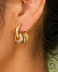 Model wearing Candy Pop Charm Hoops featuring multi-color charm accents