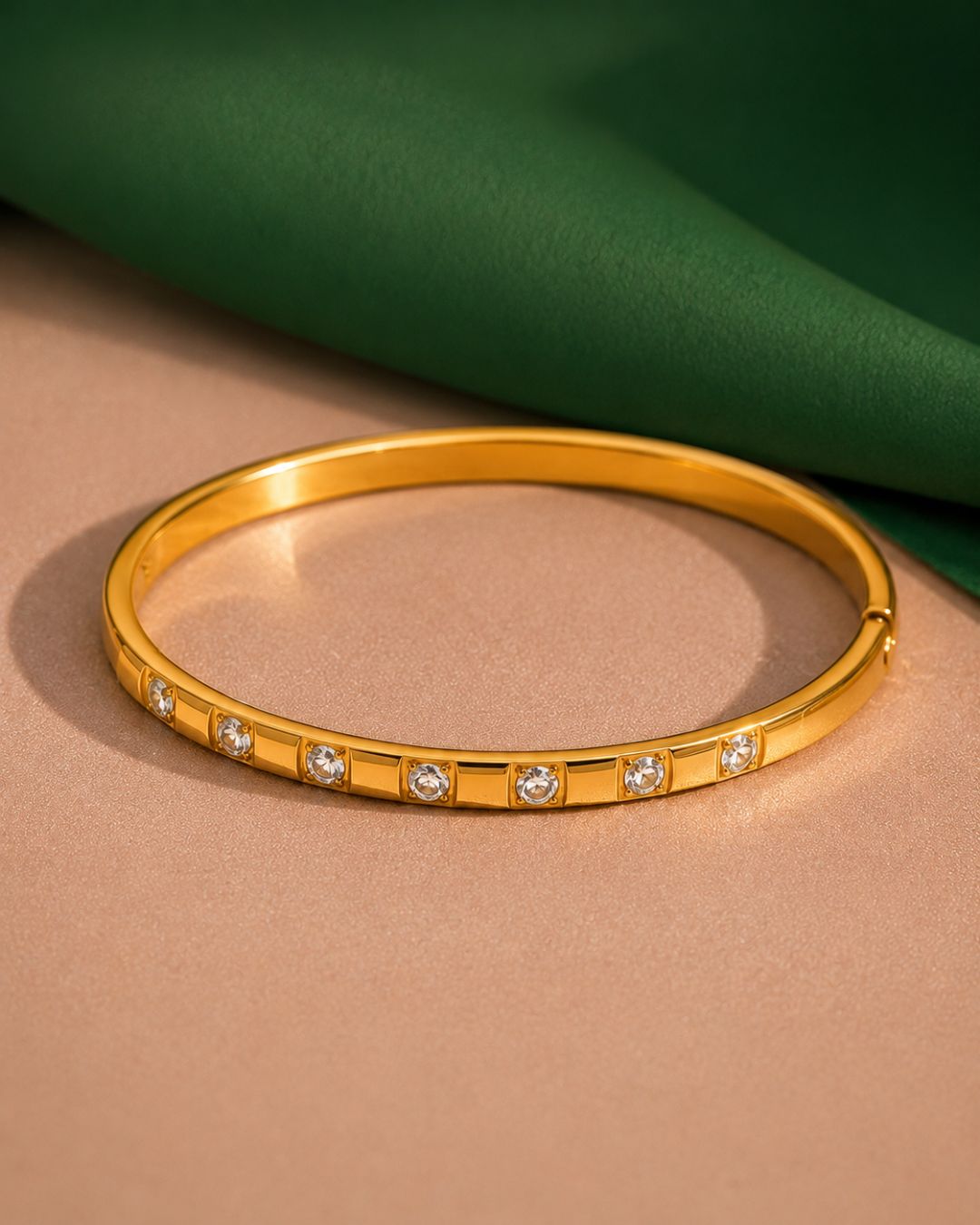 Celeste Wrap Bracelet with stone studded detailing and 18K gold plated statement design