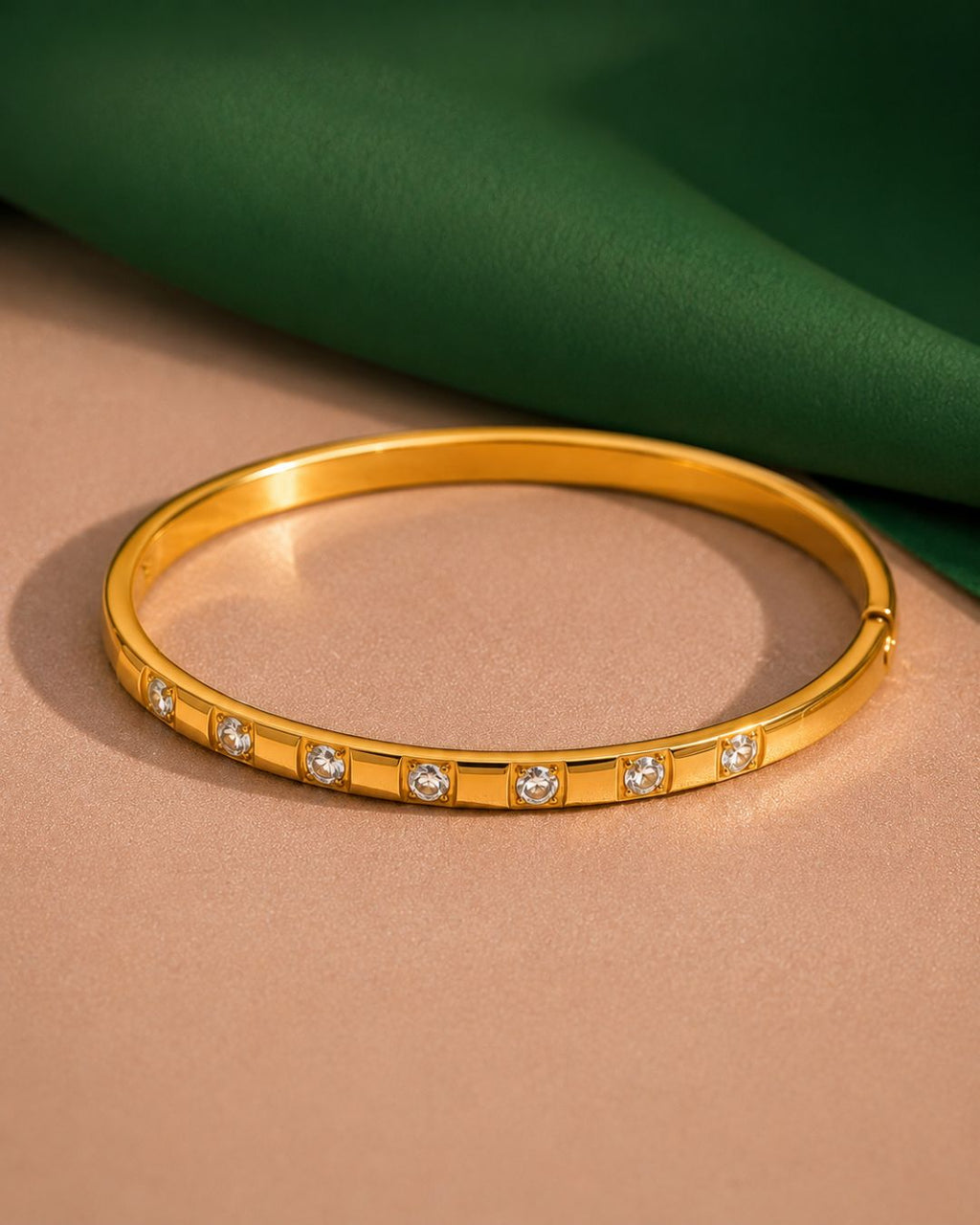 Celeste Wrap Bracelet with stone studded detailing and 18K gold plated statement design