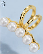close up of pearl ear cuff