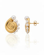 Close-up of Conch Pearl Statement Earrings featuring elegant pearl detailing and sculptural design