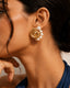Conch Pearl statement stud earrings for festive and party wear styling