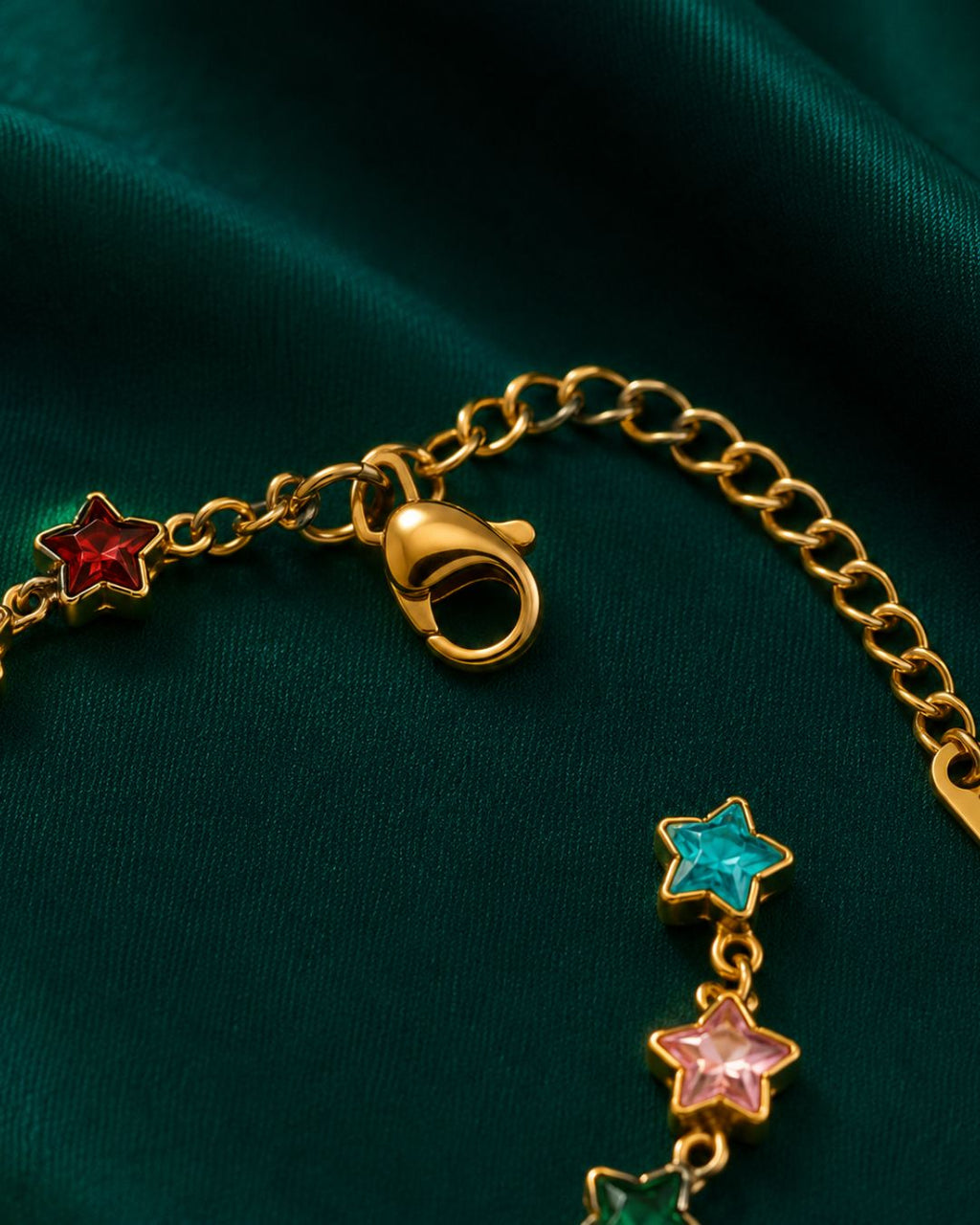 Detailed view of Cosmic Star Charm Bracelet with adjustable chain and colorful crystal star detailing