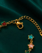 Detailed view of Cosmic Star Charm Bracelet with adjustable chain and colorful crystal star detailing