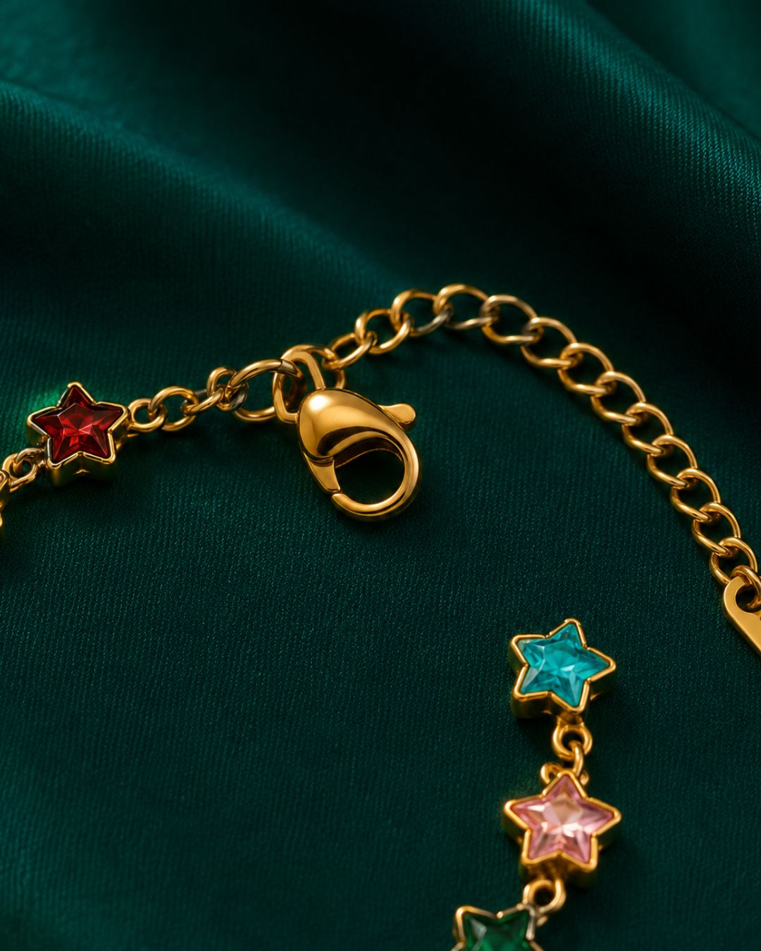 Detailed view of Cosmic Star Charm Bracelet with adjustable chain and colorful crystal star detailing