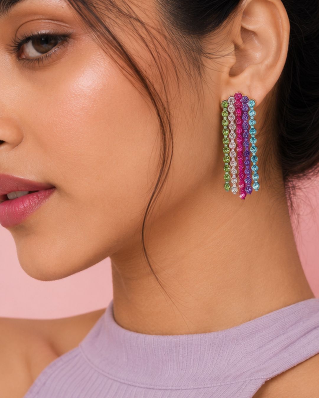 Close-up of model wearing colorful beaded earrings styling image 