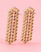 Pair of gold hoop earrings with multicolored stones back closure detail