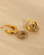 Close-up detail of Halo Glow Hoops with elegant drop design