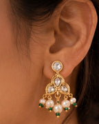 Close-up of pearl and kundan  earrings