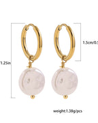 Gold hoop earrings with white round stones and measurements on a white background
