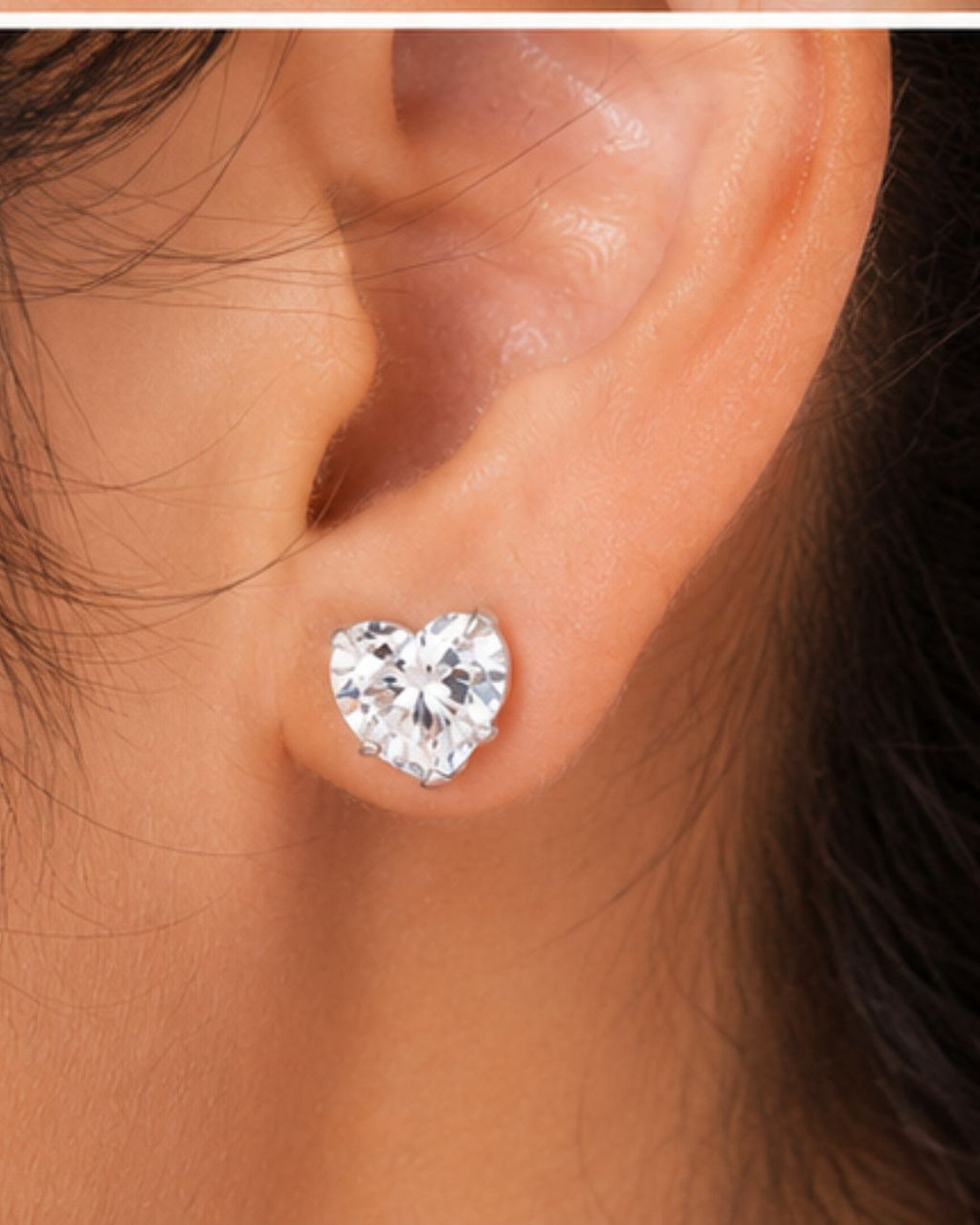 Amour Heart Stud Earrings in 925 sterling silver with sparkling heart-shaped cubic zirconia stone