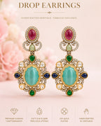 Traditional statement earrings featuring green and blue stones