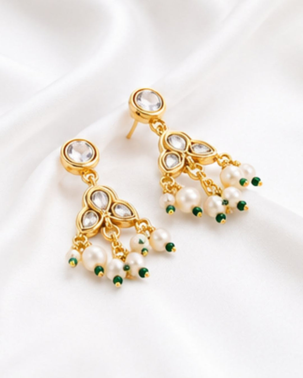 kundan earrings with pearl drops close up