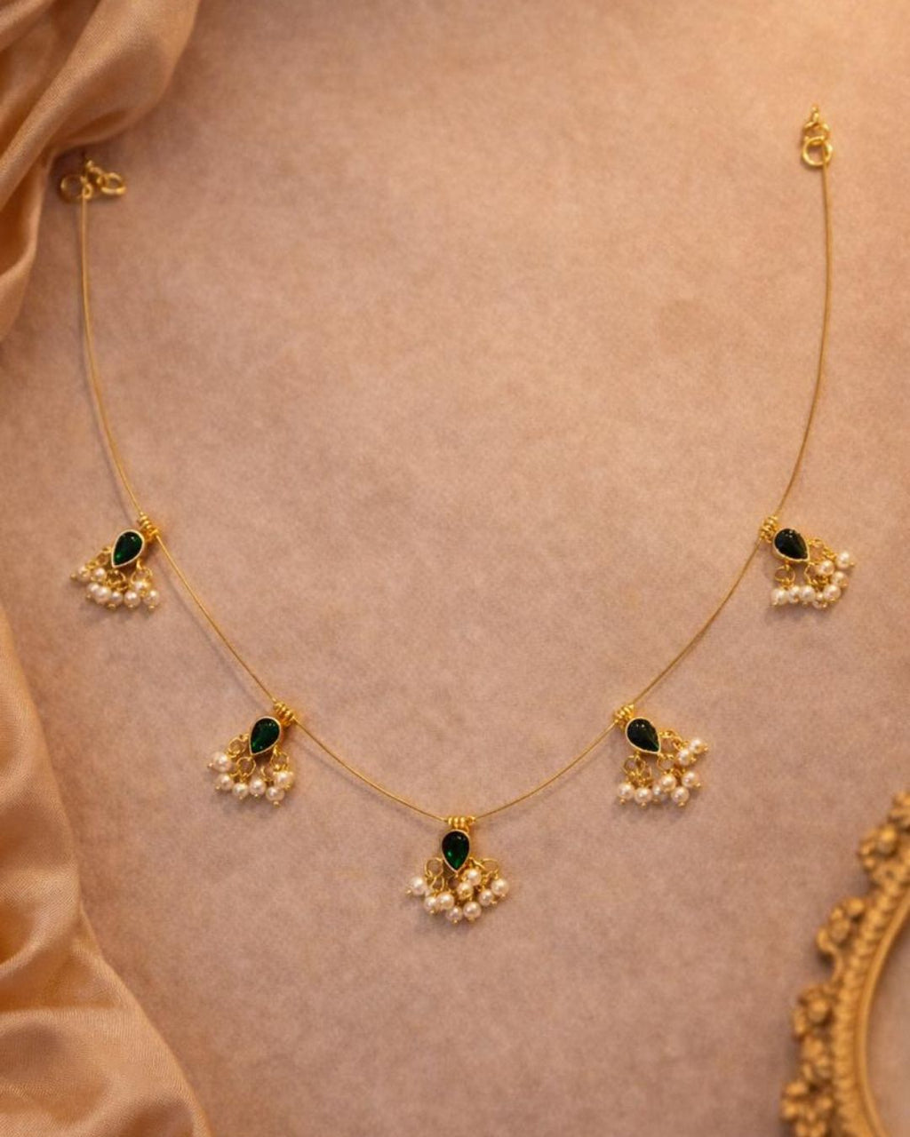 Noor Reversible Red and Green Pearl Charm Wire Necklace with 18K gold plated festive design and premium waterproof pouch packaging included