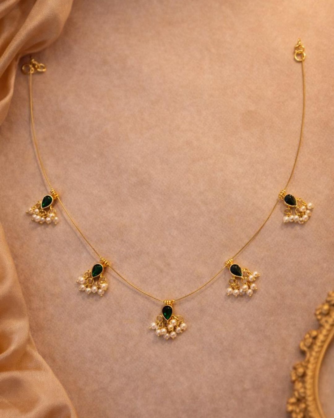 Noor Reversible Red and Green Pearl Charm Wire Necklace with 18K gold plated festive design and premium waterproof pouch packaging included