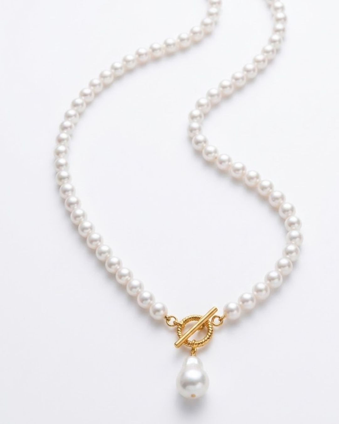 Detailed view of Luna Drop Pearl Necklace featuring toggle clasp and statement pearl drop pendant