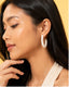 Pearl Loop Hoops featuring elegant pearl bead detailing in a statement hoop design