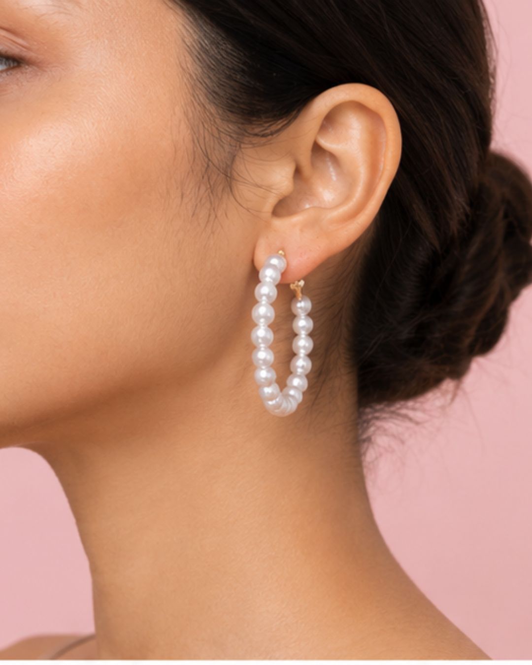 Pearl Muse Hoops with elegant pearl bead detailing in an elongated hoop design