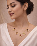 Noor Reversible Red and Green Pearl Charm Wire Necklace with 18K gold plated festive design and premium waterproof pouch packaging included