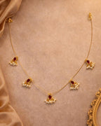 Noor Reversible Red and Green Pearl Charm Wire Necklace with 18K gold plated festive design and premium waterproof pouch packaging included