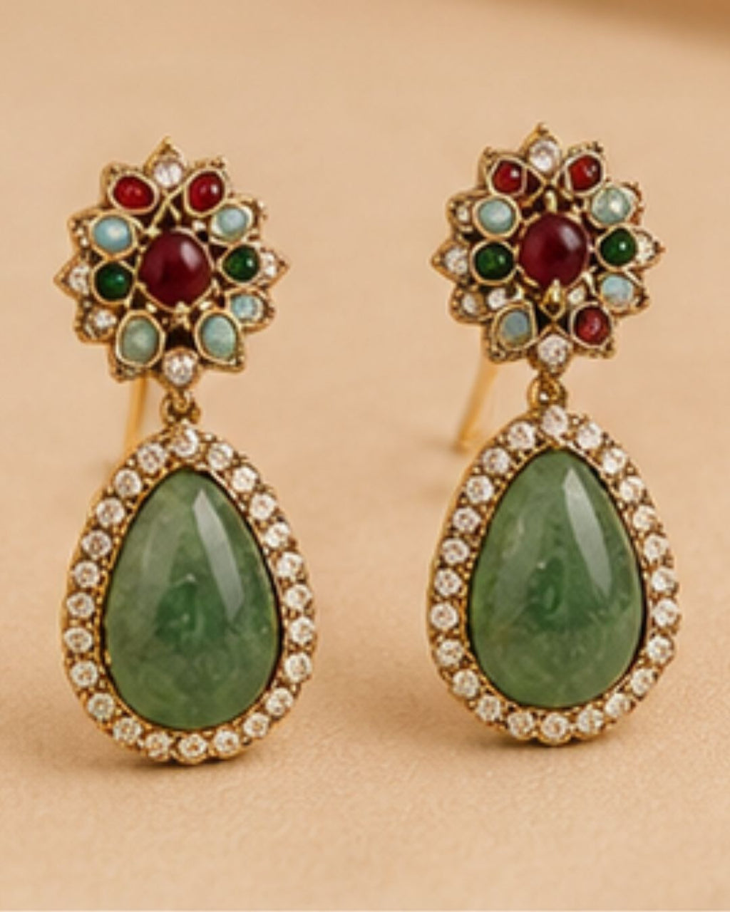 Green stoneearrings framed with delicate cz accents