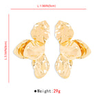 Gold earrings with measurements and weight displayed on a white background